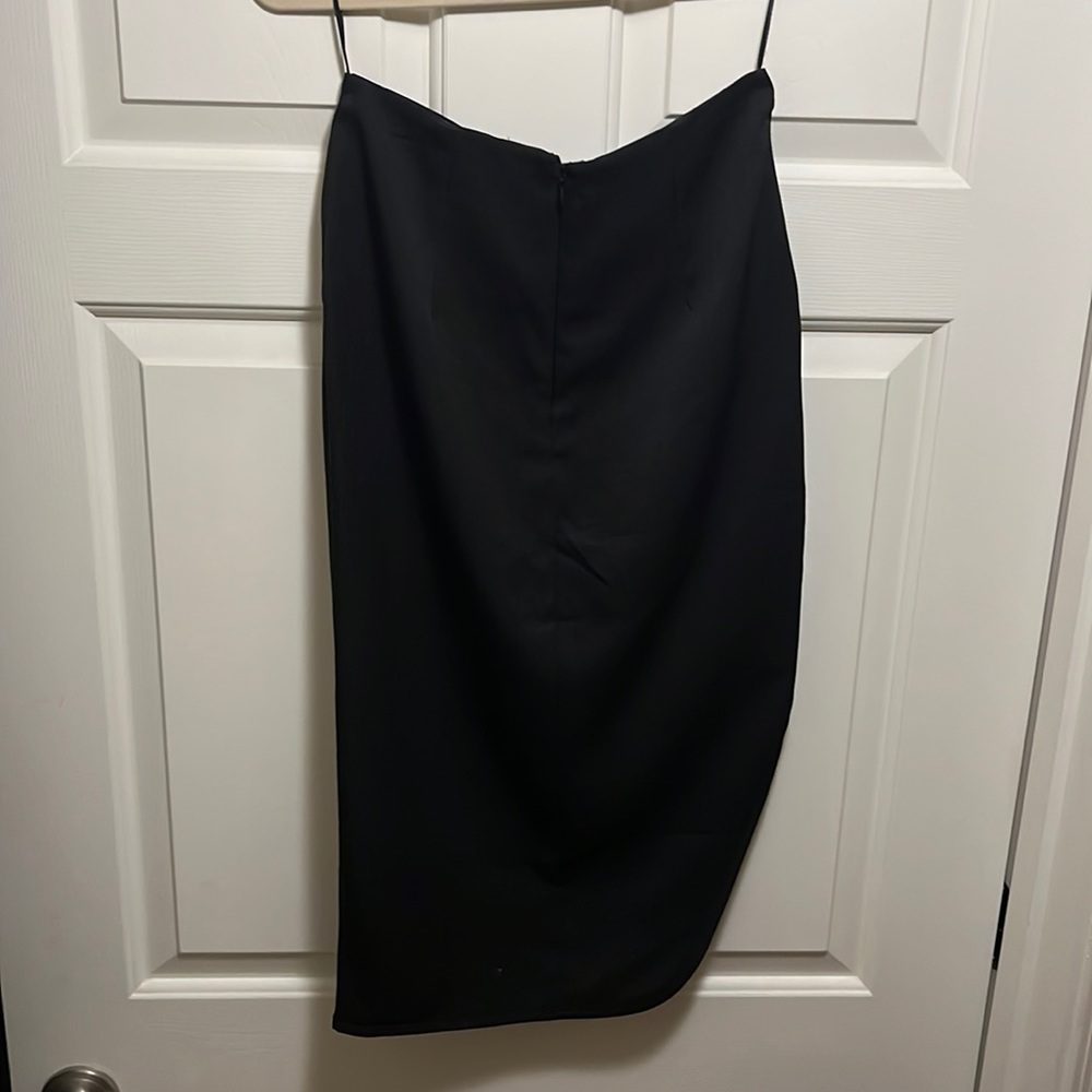 High Low asymmetrical skirt with wrap detail.